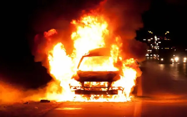 Woman Escapes Unscathed as Car Catches Fire in City - News Karnataka