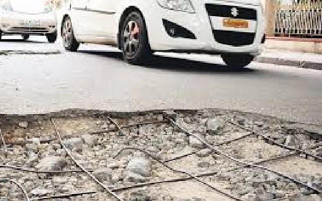 BBMP Faces Criticism Over Pothole Management Amidst Heavy Rains - News Karnataka