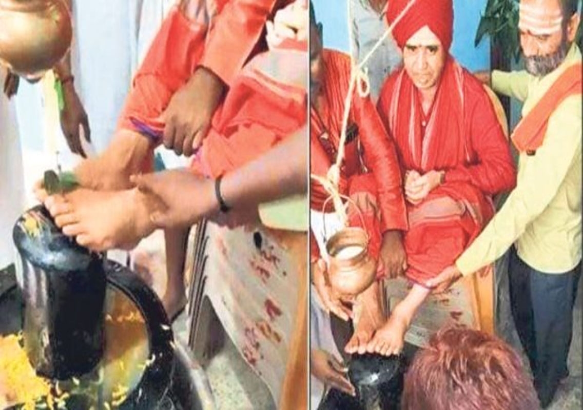 Shiva Devotees Outraged as Head of Panchagriha Hiremath Places Feet on Shiva Linga - News Karnataka