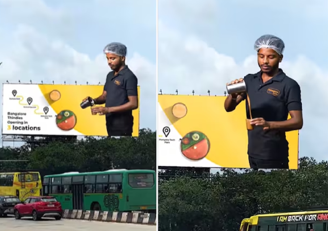 The billboard showcases a nearly life-like man pouring filter coffee - News Karnataka