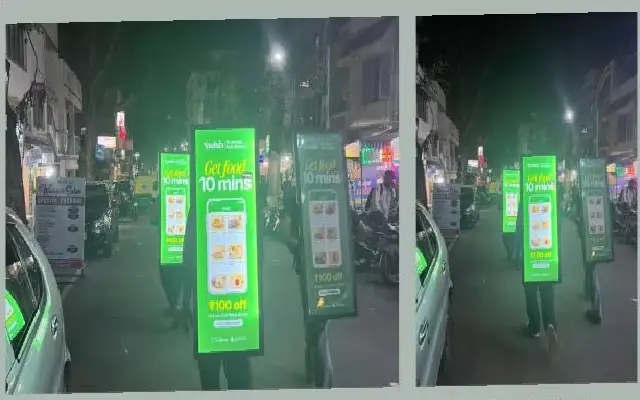 "Human Billboards Spark Debate on Bengaluru Streets" - News Karnataka