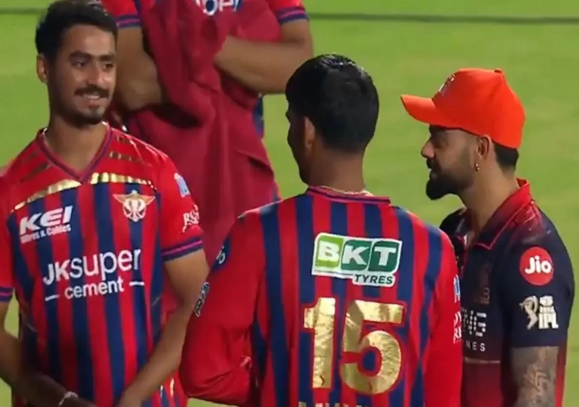Kohli stops LSG youngster touching his feet viral IPL 2026 - News Karnataka