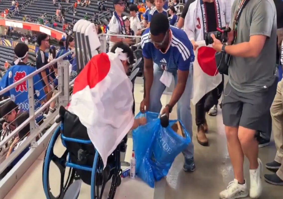 Japan fan in wheelchair cleans stadium, wins hearts - News Karnataka