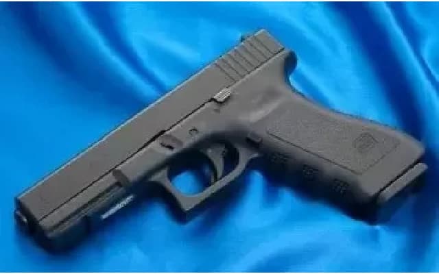 Dramatic Arrest in Vijayapura: Police Officer Wields Pistol to Disperse Crowd