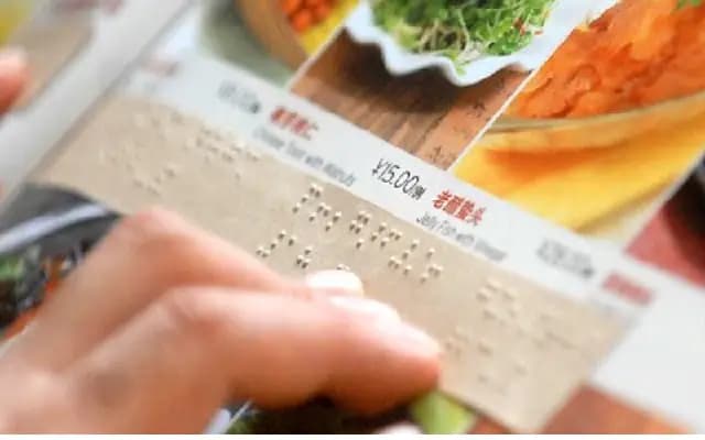 Yi Mangaluru launches braille menu initiative at Nosh