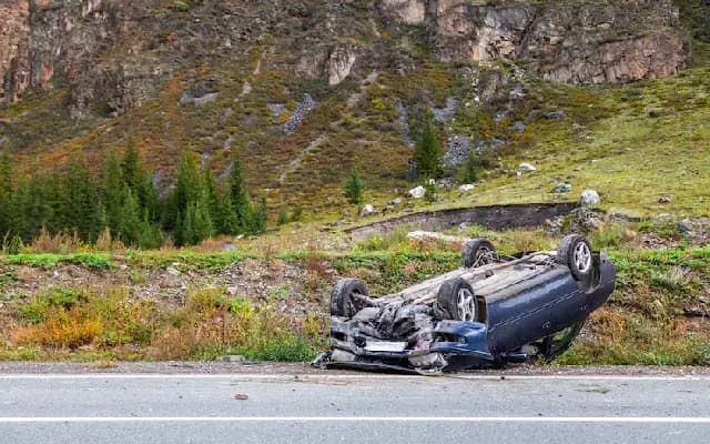 Car Overturns at Alakemajalu Curve; Occupants Escape Unharmed