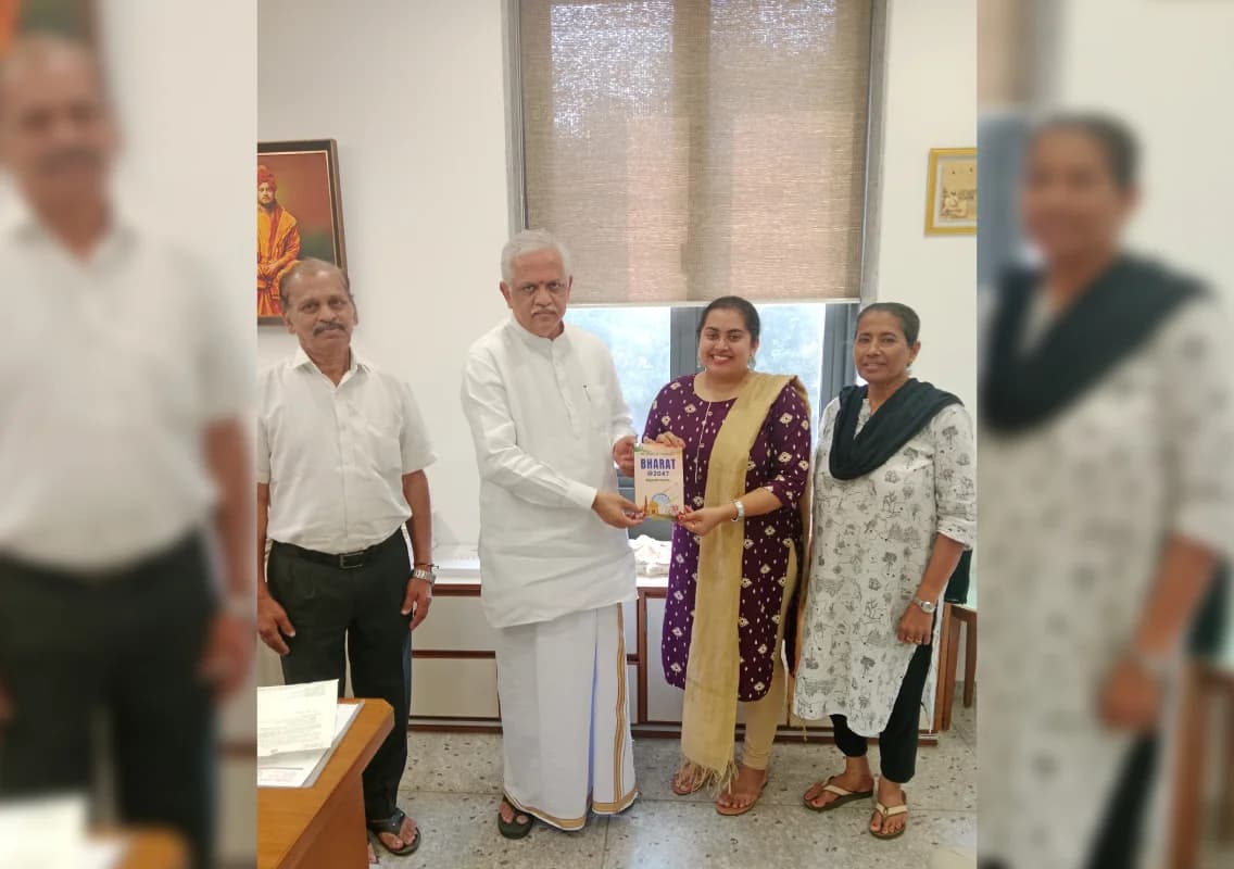 Young author Reshel Fernandes presents award-winning book to BJP leader