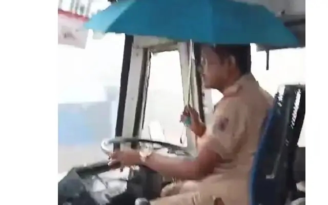 NWKRTC Driver Suspended For Driving Bus With Umbrella - News Karnataka