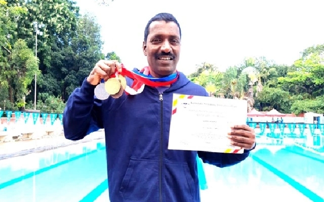 Gopal Kharvi Represents Karnataka in National Swimming Championship - News Karnataka