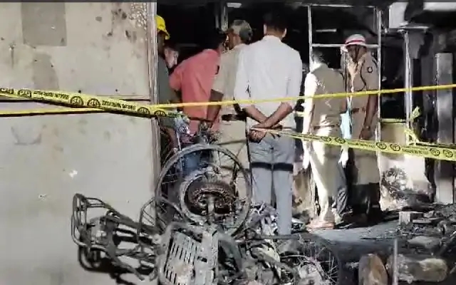 Tragedy at Bengaluru EV Showroom: Accountant Dies in Fire - News Karnataka