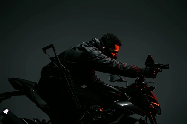 Man holds toy gun while riding bike, for social media fame, arrested - News Karnataka