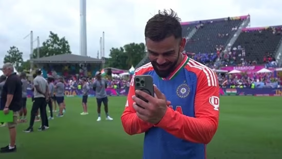 Virat Kohli's Phone Call During India's Trophy Celebration Sparks Viral Reaction - News Karnataka