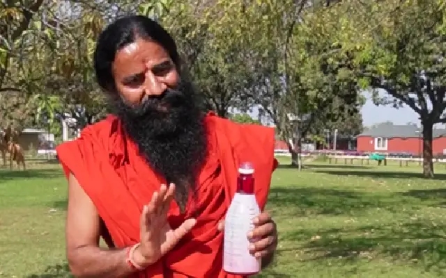 Ramdev's "Sharbat Jihad" Remark Sparks Backlash: Controversy Over Promoting Patanjali - News Karnataka