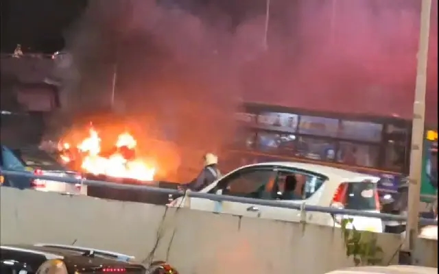 Car Catches Fire on Hebbal Flyover, Disrupting Traffic in Bengaluru - News Karnataka