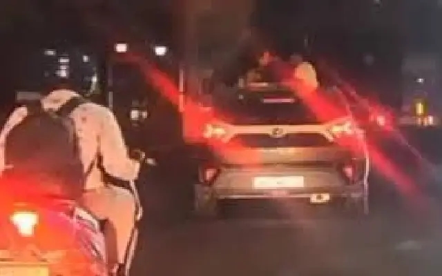 Couple’s PDA in Moving Car at Trinity Circle Sparks Outrage Online - News Karnataka