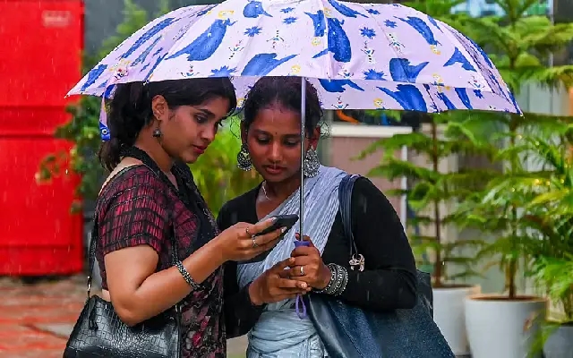 Bengaluru Soaked Again: Sudden Downpour Floods Roads - News Karnataka