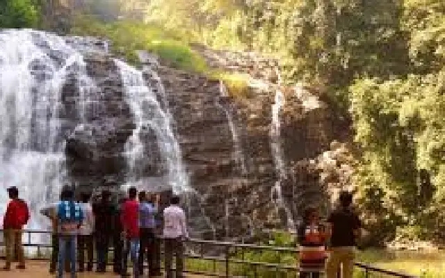 Monsoon Magic at Abbey Falls: Tourists Thrill to Nature’s Rainy Dance in Madikeri - News Karnataka