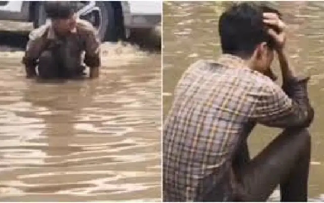 Jaipur man breaks down after phone vanishes in flooded street - News Karnataka
