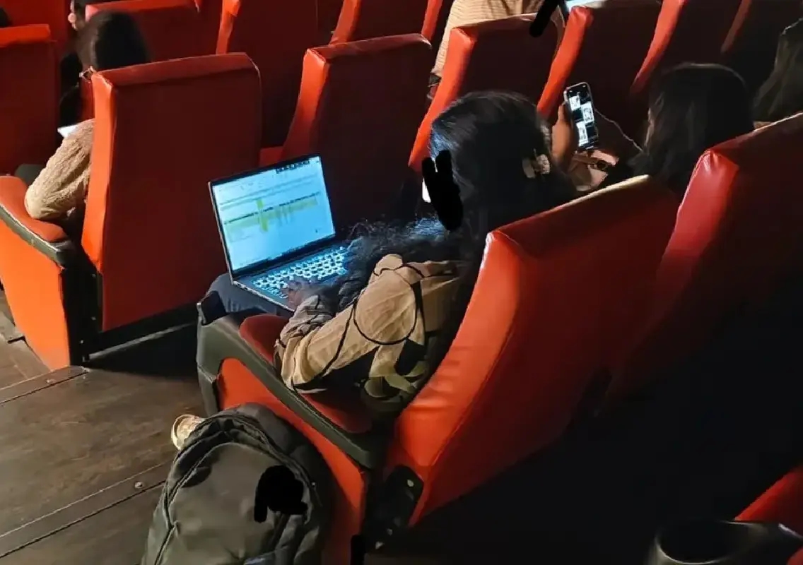 Laptop in theatre sparks debate on Bengaluru’s hustle culture - News Karnataka