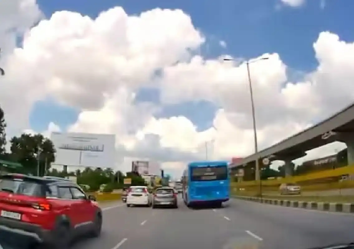 BMTC Bus Driver Caught Attempting to Ram Car on Bengaluru Airport Road - News Karnataka