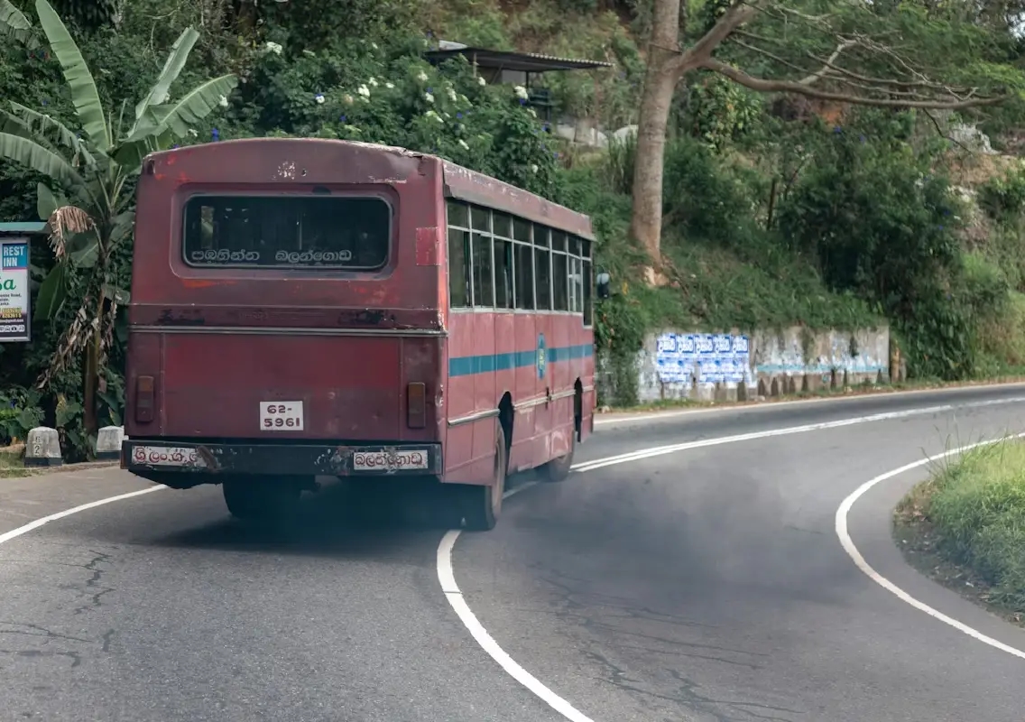 Tourist bus overturns on road; students injured - News Karnataka