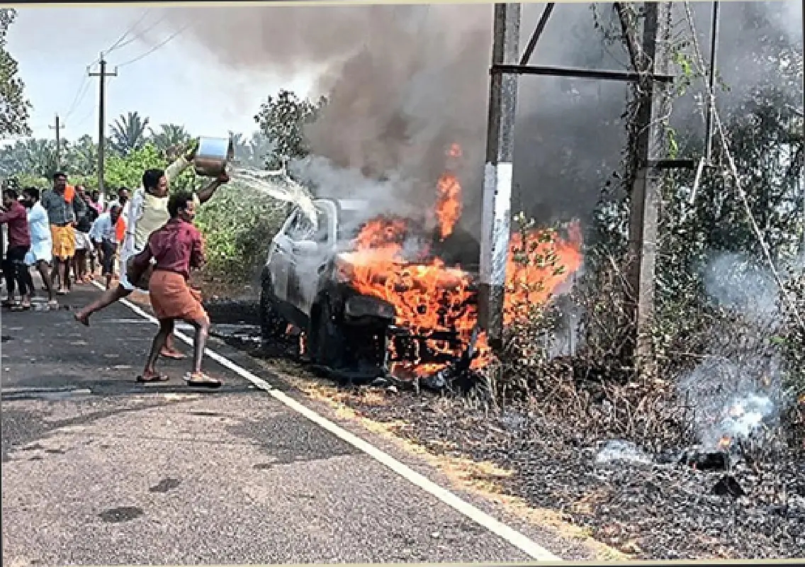 Car gutted by fire after gas balloon triggers short circuit near temple - News Karnataka