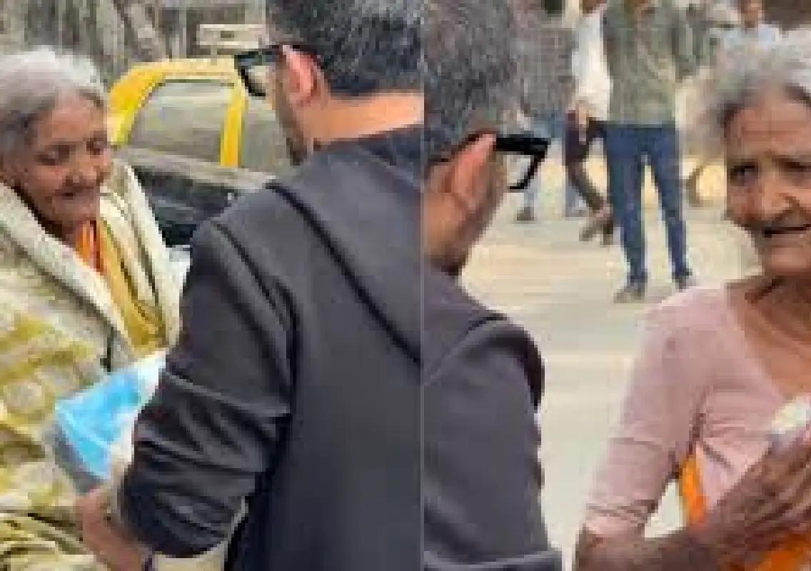Influencer surprises elderly woman cleaning cars roadside - News Karnataka