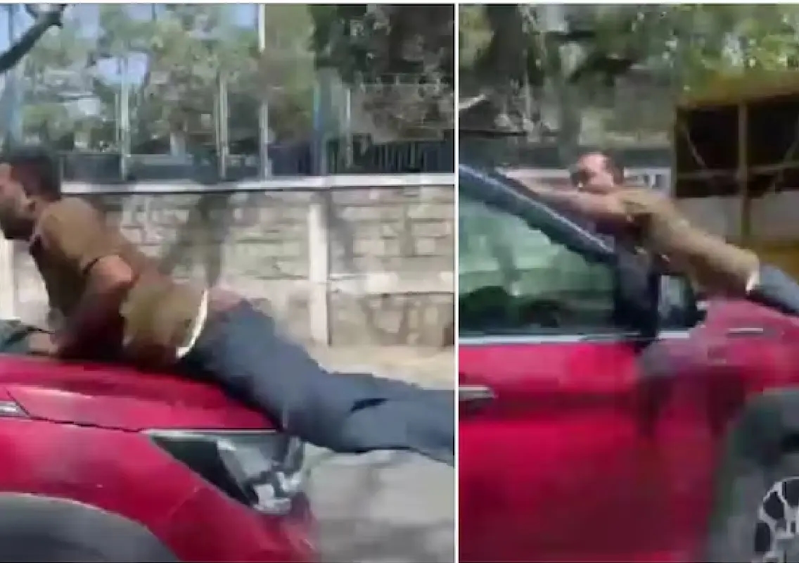 Man drives car with person on bonnet in road rage case - News Karnataka