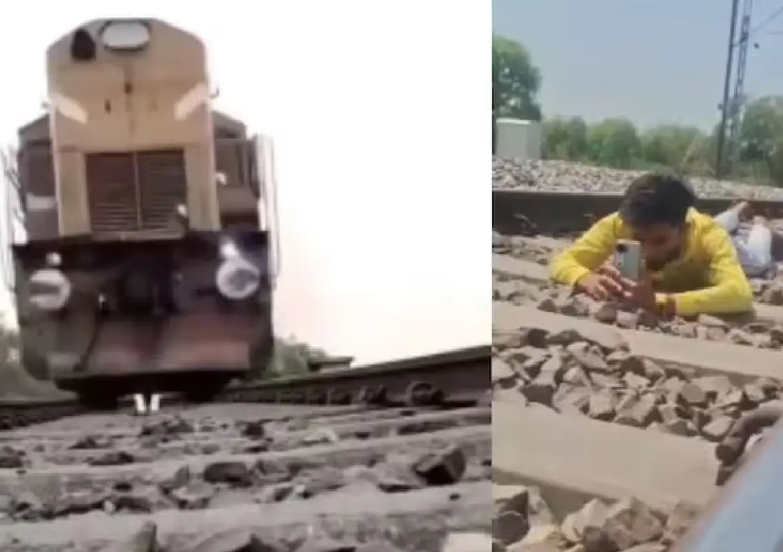 Man lies between tracks as train passes overhead, police issue stern warning - News Karnataka