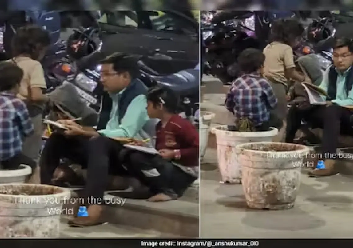 Man teaching homeless children on footpath goes viral - News Karnataka
