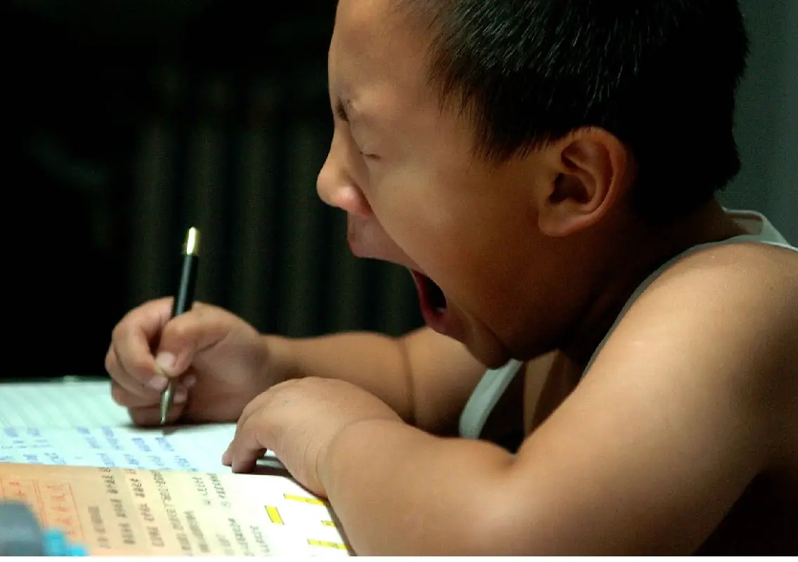 China moves to cut homework, ease student stress - News Karnataka