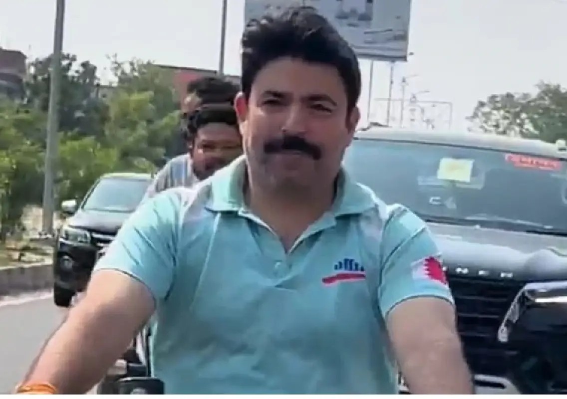 BJP MLA fined after viral helmetless bike ride video - News Karnataka