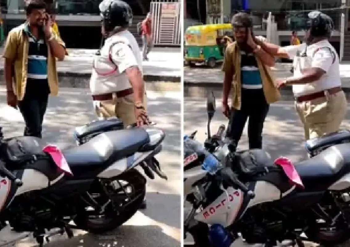 Bengaluru cop caught on video slapping auto driver after accident - News Karnataka