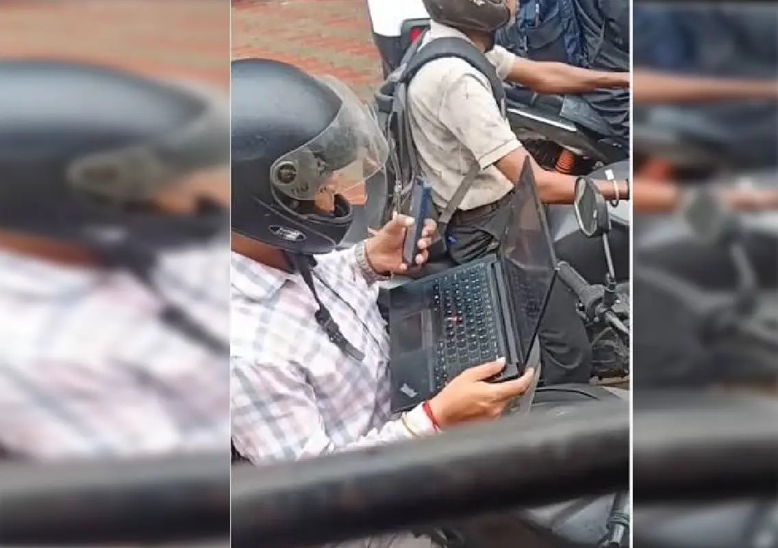 Laptop at traffic signal sparks debate on India's work culture - News Karnataka