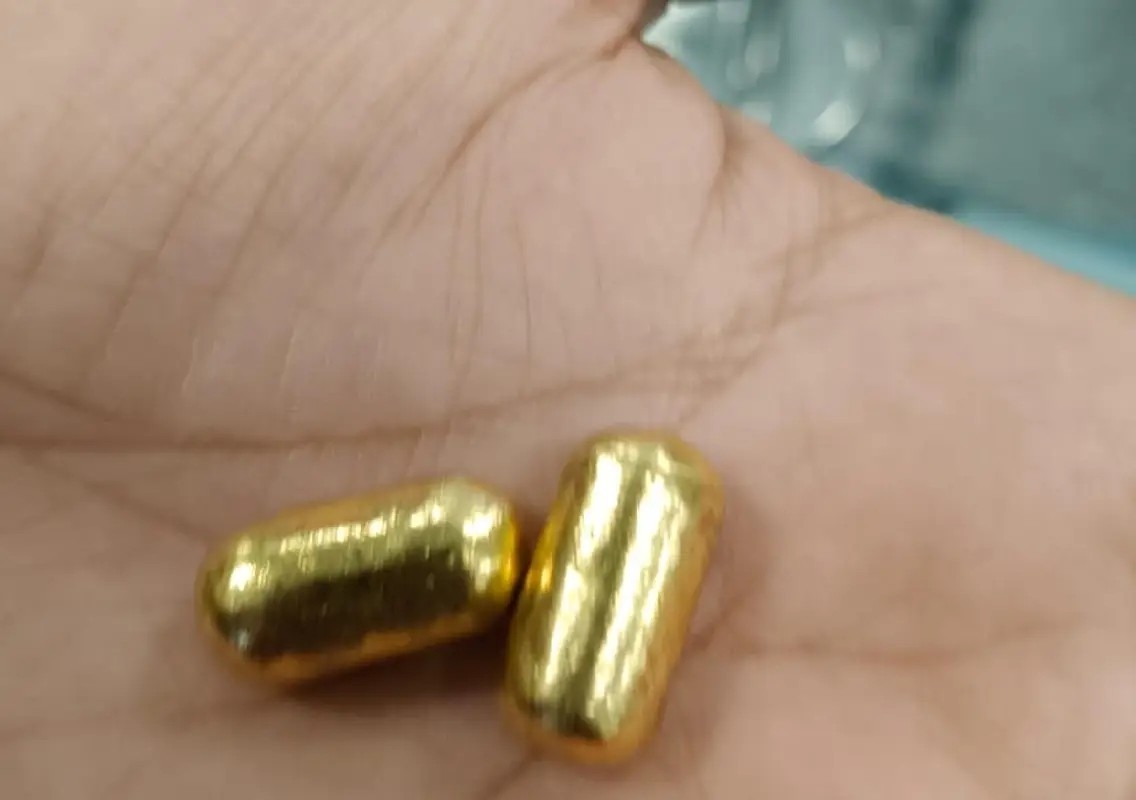 82-gram yellow-metal capsules found hidden in passenger’s mouth - News Karnataka
