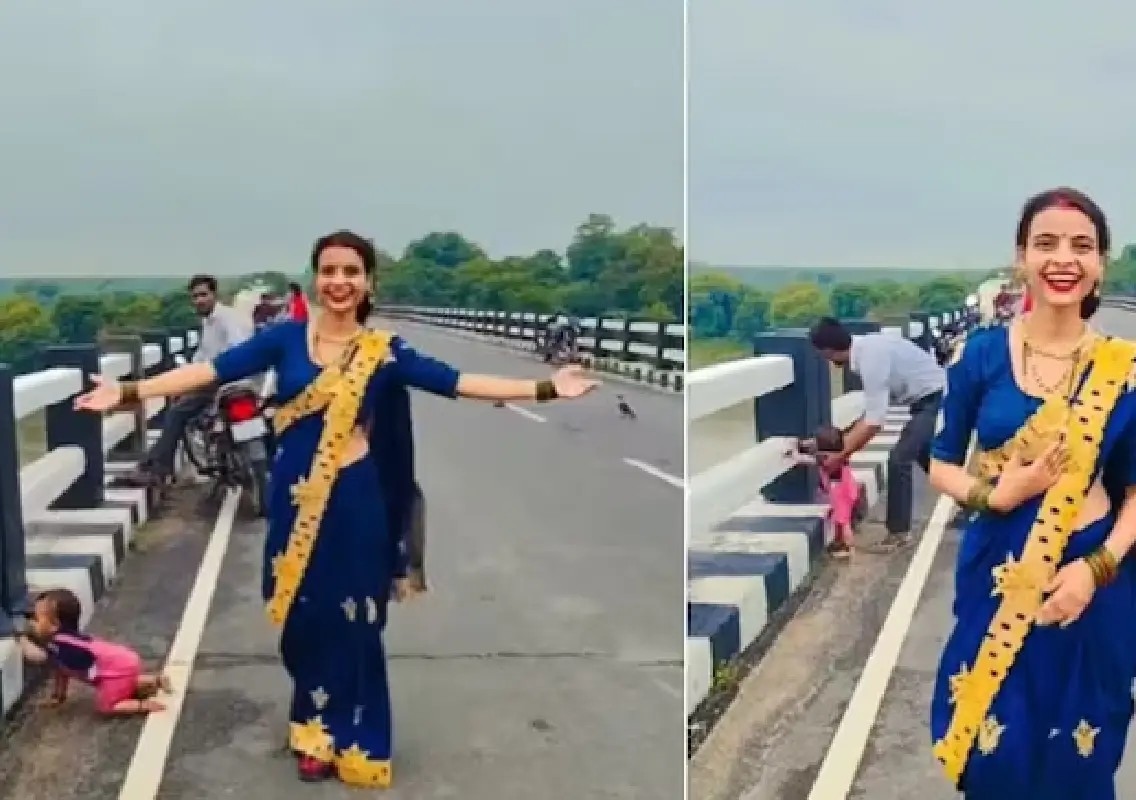 Baby crawls towards bridge edge as mother films reel - News Karnataka
