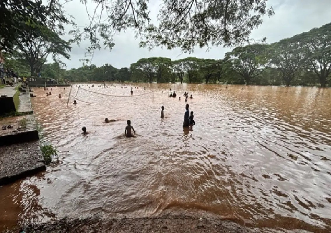 Flooded school ground becomes playground for children in Bantwal - News Karnataka