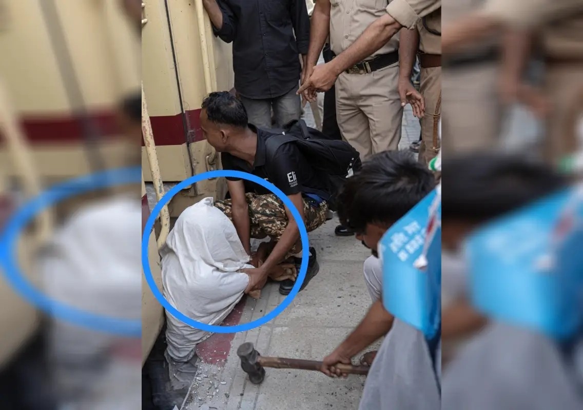 Man rescued after passengers break platform to free him: WATCH - News Karnataka