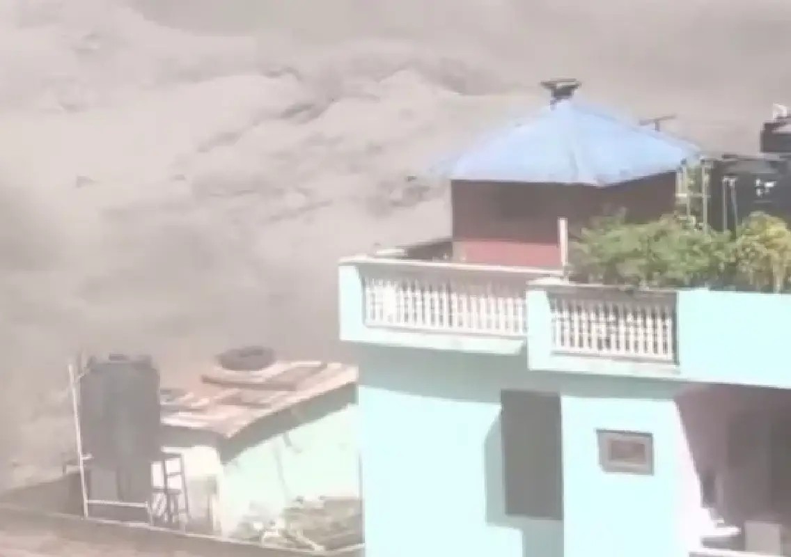 People cling to balcony as powerful floodwaters sweep through Nepal - News Karnataka