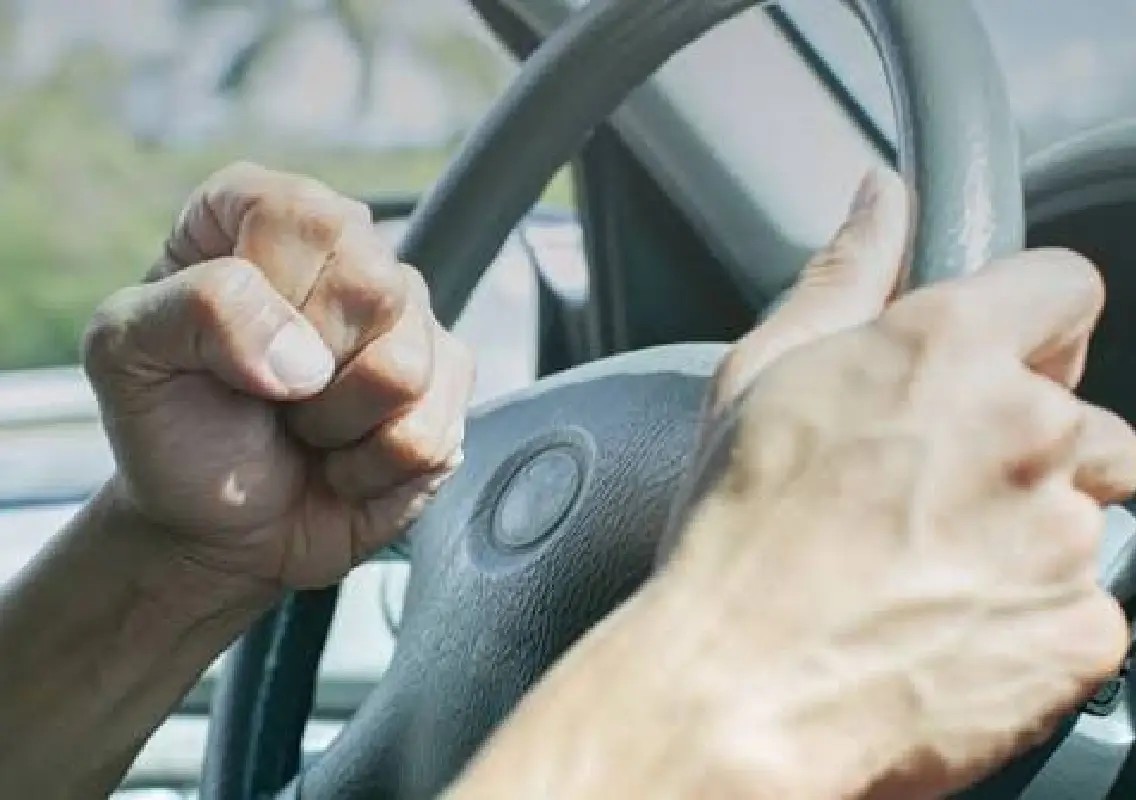 Road rage turns dangerous as cab driver dragged on car bonnet for 2 km - News Karnataka