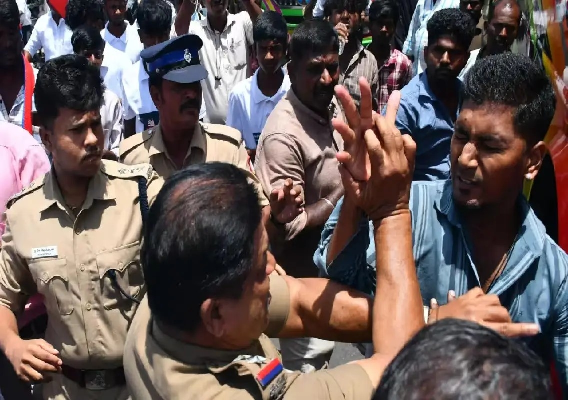 VCK road blockade turns tense after police officer slaps youth: WATCH - News Karnataka