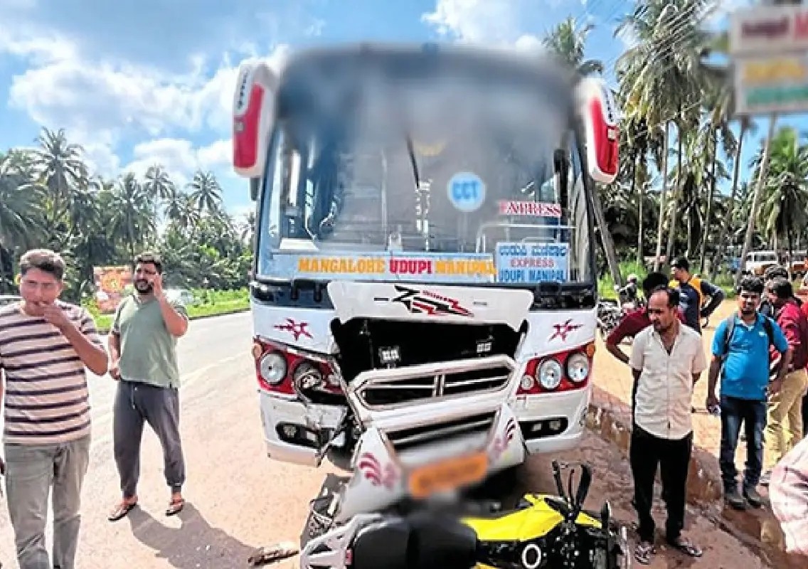 Kaup bike rider escapes injury in bus collision - News Karnataka