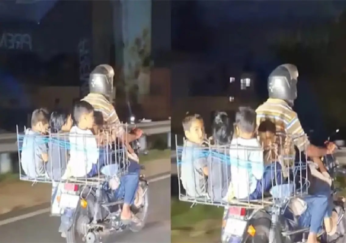 Video of man riding two-wheeler with six children sparks concern: WATCH - News Karnataka