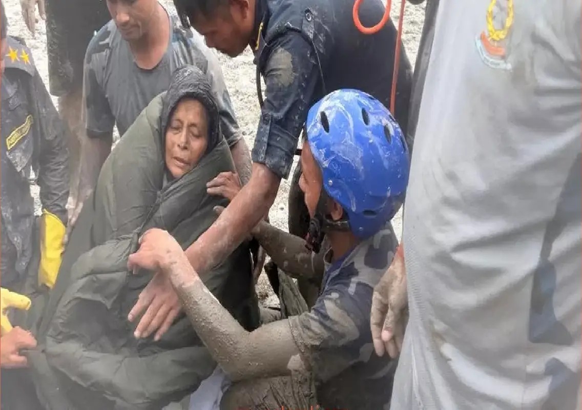 Woman rescued alive after 11 days buried under house in Nuwakot: WATCH - News Karnataka