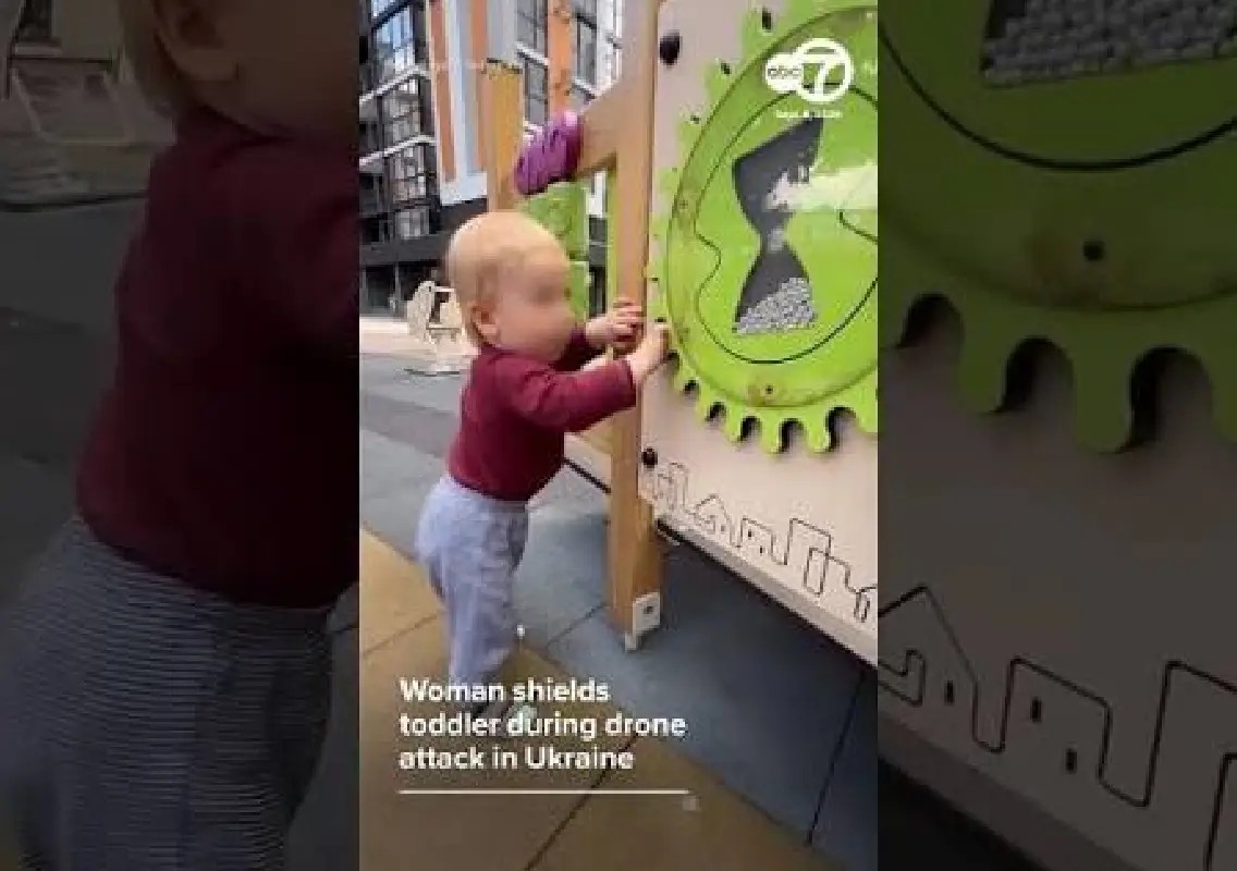 Woman shields toddler as Russian drone attack strikes Kyiv - News Karnataka