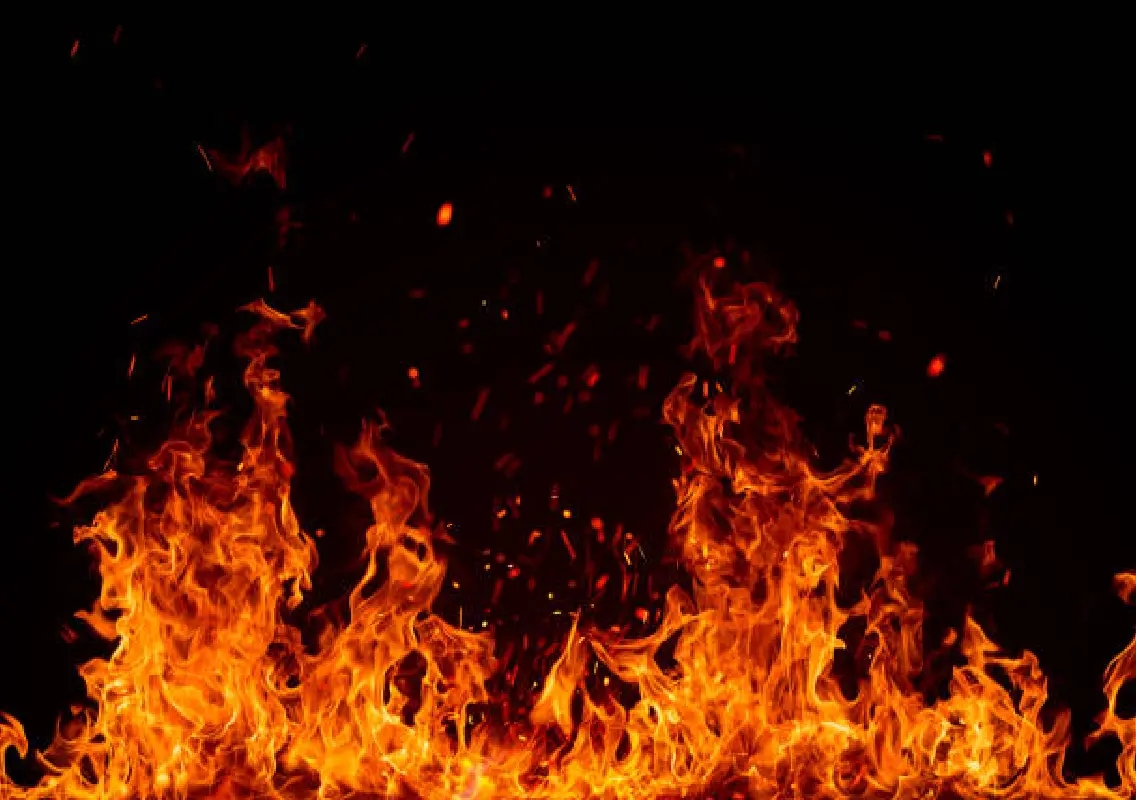 Fire damages wooden materials in old building on Puttur Main Road - News Karnataka