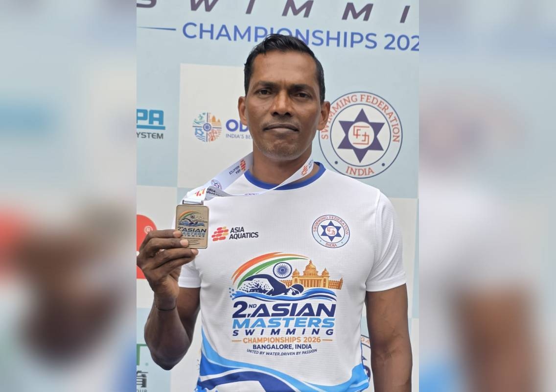 Mangaluru ASI Girish Suvarna Wins Two Medals - News Karnataka