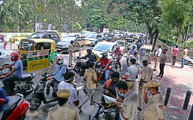 Police checking in traffic at hudson circle in Bengaluru main