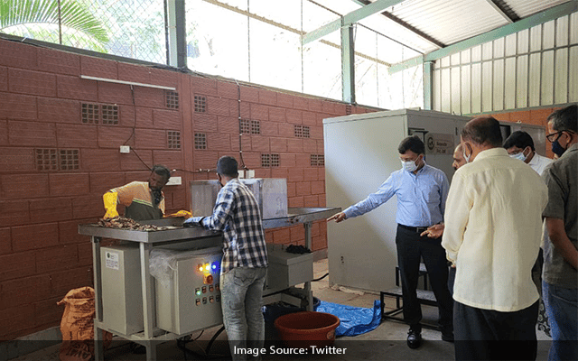 Gaurav Gupta inspecting we waste machines