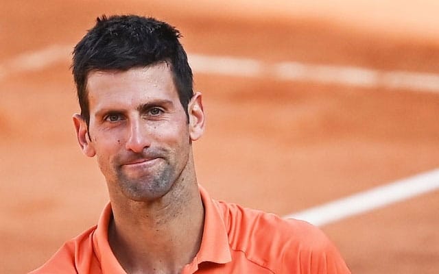 Djokovic wins over Wawrinka moves to Italian Open quarters